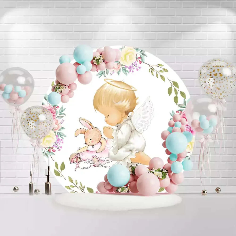 Round baby shower backdrop with angel, bunny, and pink floral design