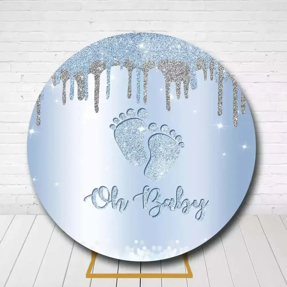 Oh Baby themed backdrop with glitter footprints and silver dripping effect for baby shower