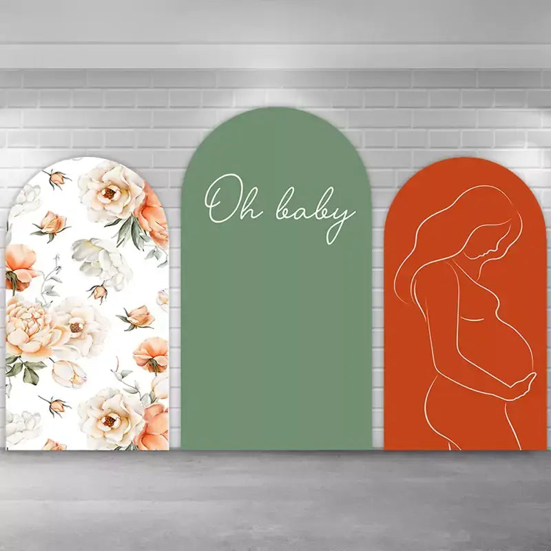 Three-piece baby shower arch backdrop set featuring peach and cream watercolor florals, a sage green ‘Oh baby’ center arch, and a terracotta panel with a minimalist line-art pregnant woman.