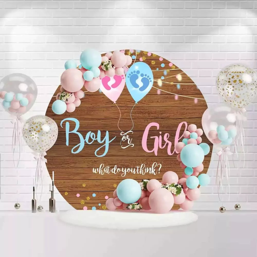 Boy or Girl circle backdrop featuring fairy lights, confetti, and rustic wood for baby shower