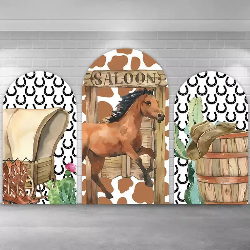 Western cowboy-themed backdrop set featuring a saloon, galloping horse, cactus, wagon, and cowboy boots with horseshoe patterns, ideal for wild west or western-themed parties.
