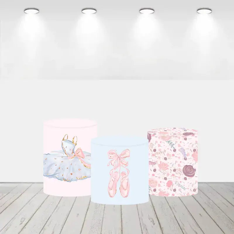 Set of three cylinder covers with designs including a tutu, ballet shoes, and a floral pattern, all in soft pastel colors.