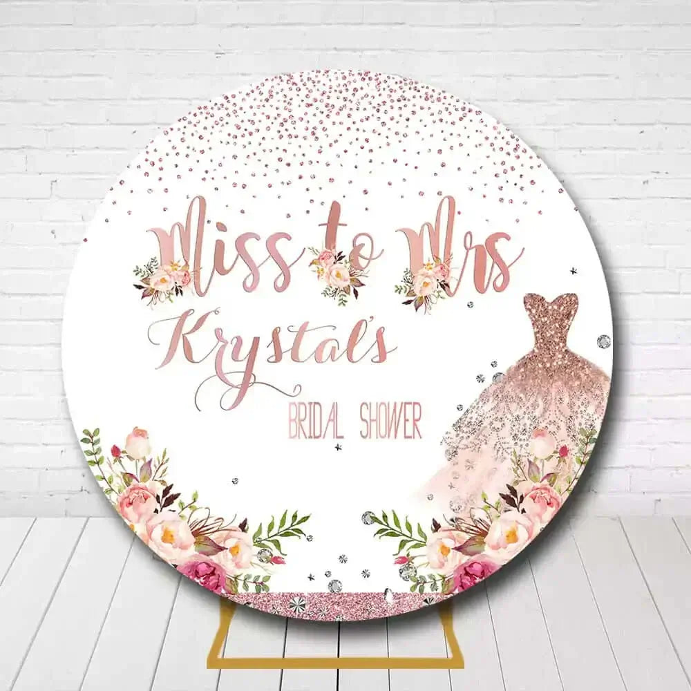 Elegant floral bridal shower backdrop with Miss to Mrs text and sparkling gown illustration