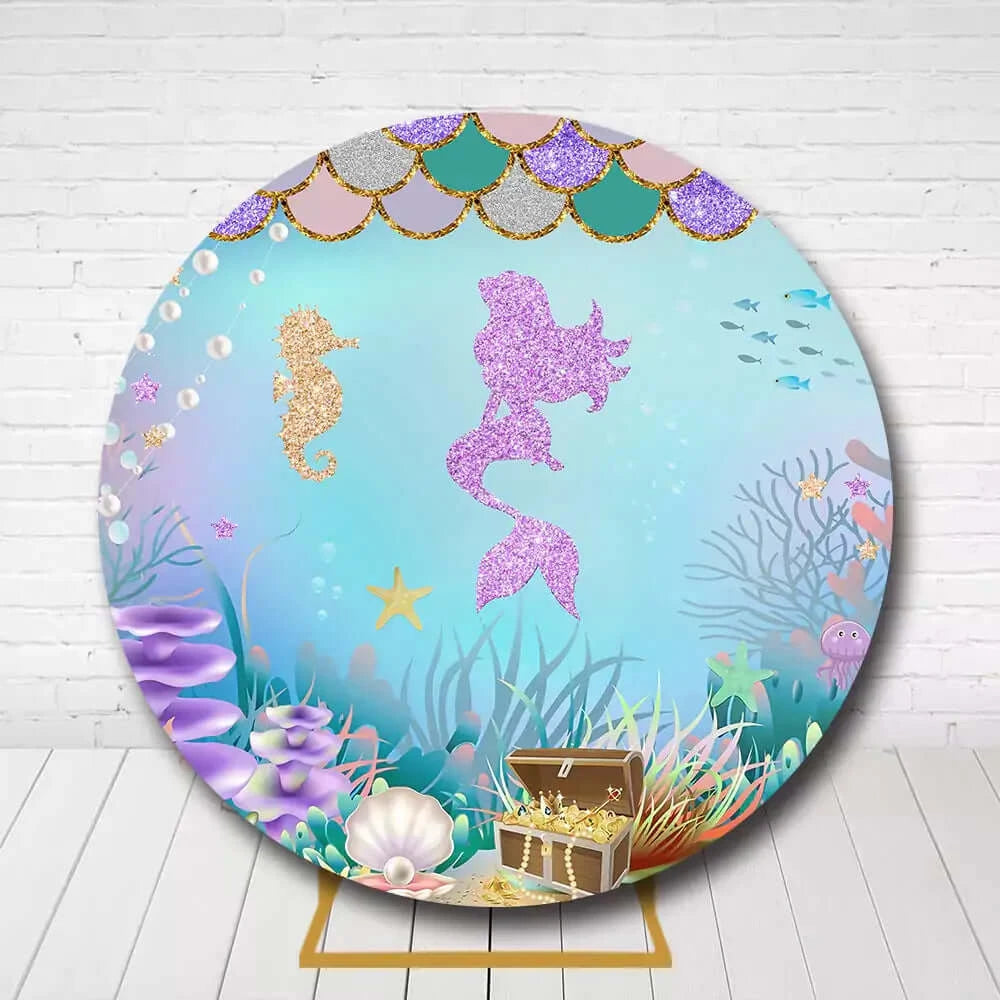 Under the sea circle backdrop featuring mermaid, fish scales, bubbles, and ocean design