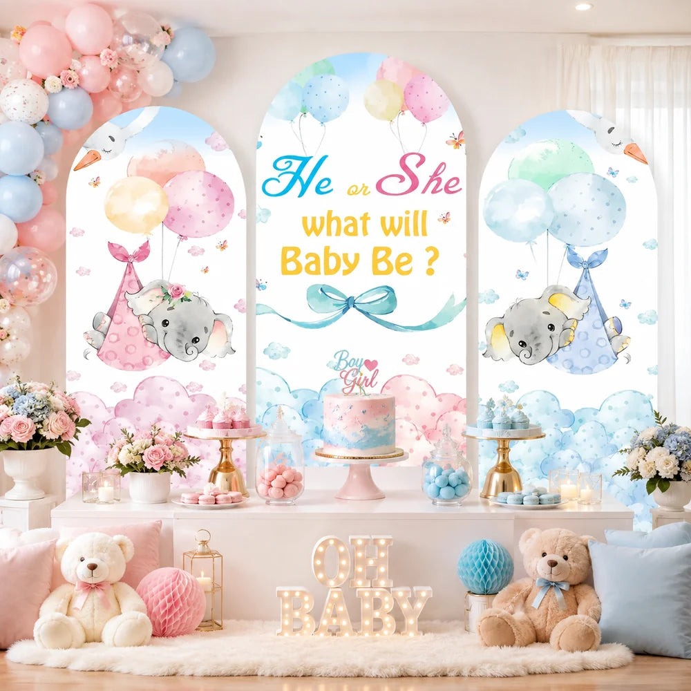 Pink and blue elephant gender reveal set with three arch backdrop covers featuring He or She What Will Baby Be lettering, balloons, clouds and baby elephant designs.