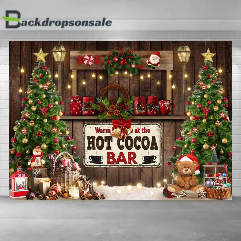Festive Christmas backdrop featuring a hot cocoa bar, Christmas trees, and holiday decorations