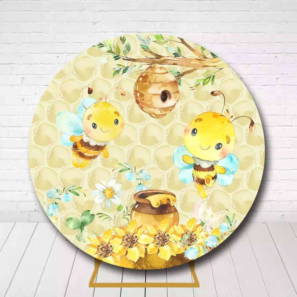 Cute circle backdrop featuring smiling bees, beehive, and balloons for baby shower
