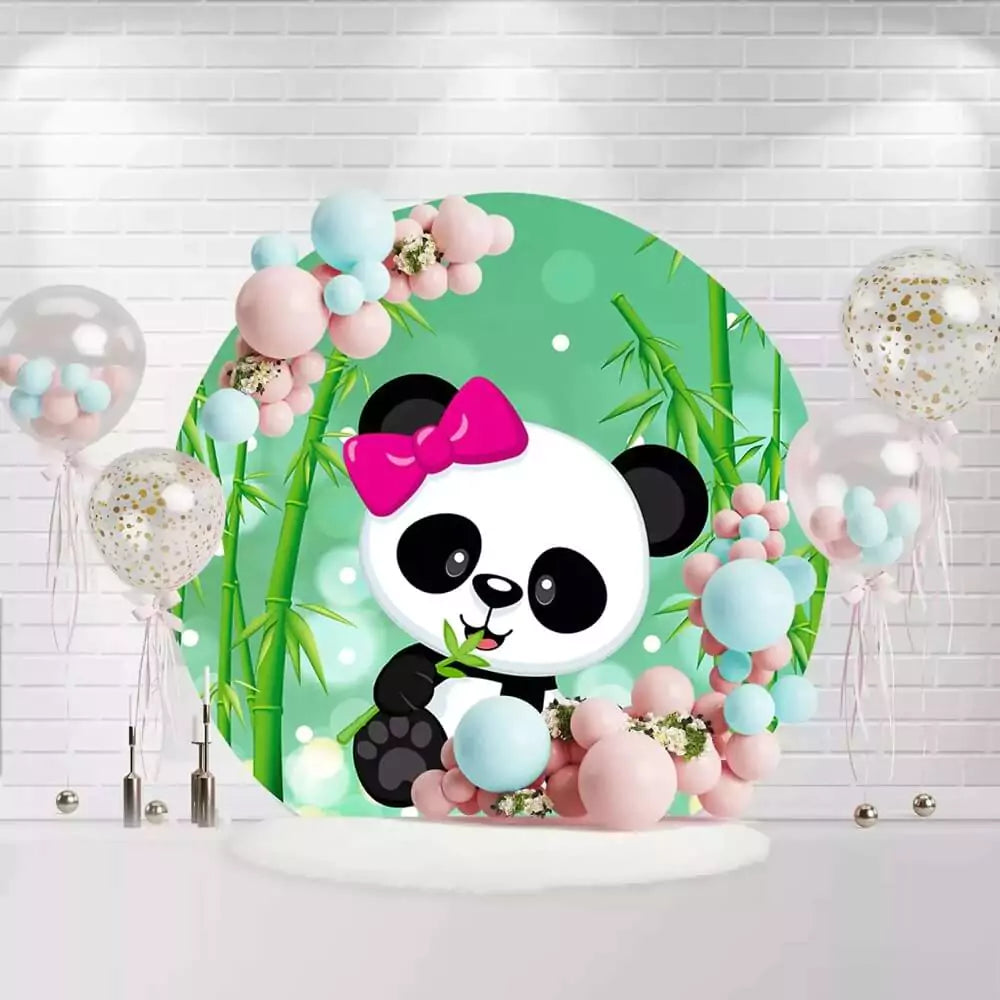 Cute panda eating bamboo with pink bow backdrop for baby girl’s first birthday