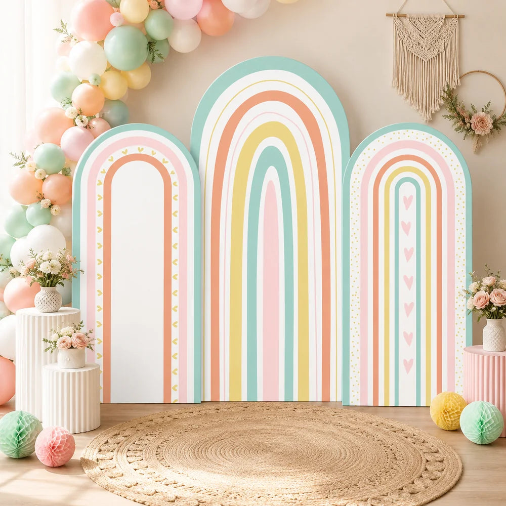 Pastel rainbow party set with three arch backdrop covers featuring mint green, blush pink, peach and yellow rainbow stripes with heart and dotted details.