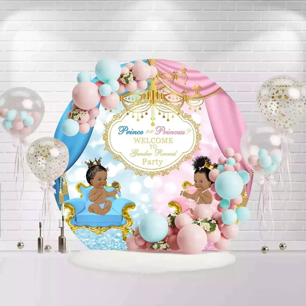 Round gender reveal backdrop with prince and princess theme, blue and pink curtains, and golden accents