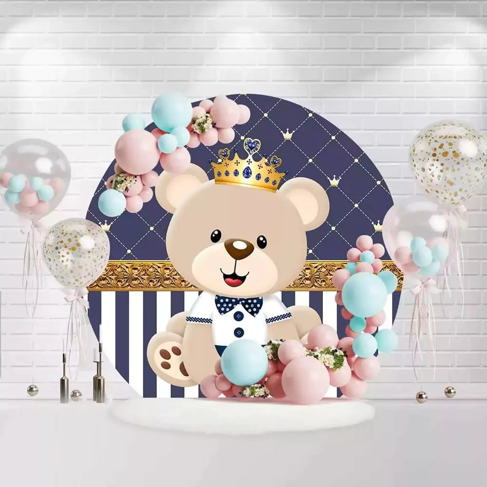 Royal teddy bear wearing a crown for baby boy’s birthday party backdrop