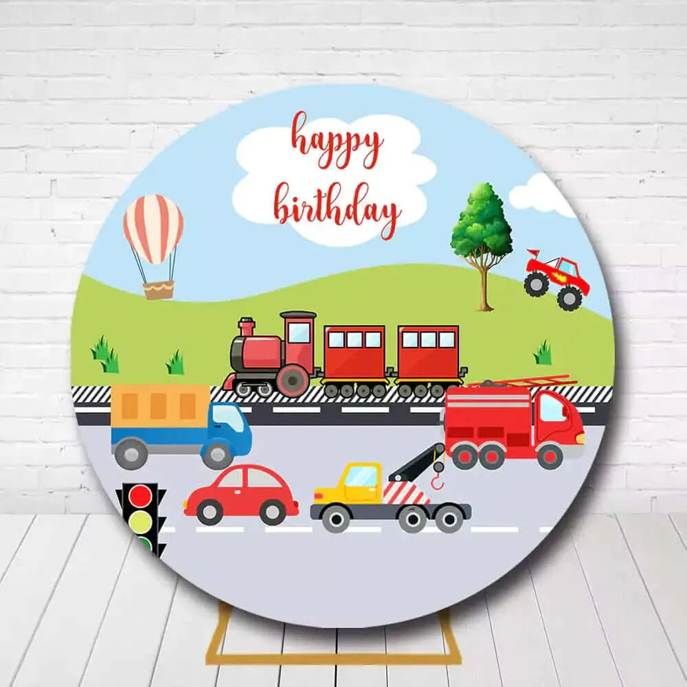 Transportation-themed circle backdrop for kids' birthday with vehicles like cars, trucks, and a fire truck