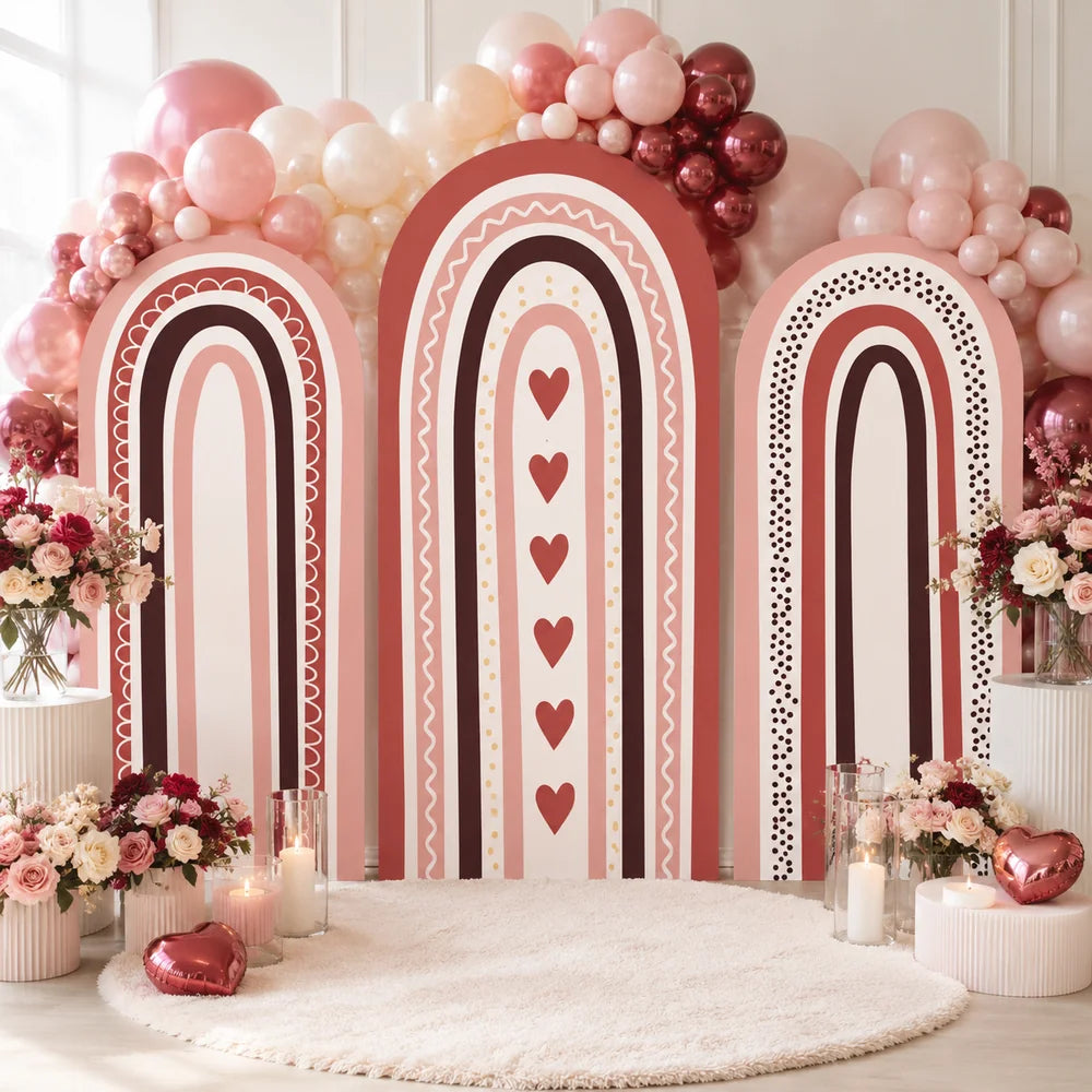 Valentine party set with three arch backdrop covers featuring layered rainbow arches in blush pink, terracotta, burgundy and cream with hearts, dots, scallops and wavy line details.