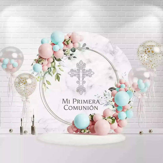 Round First Communion backdrop with a cross design and floral greenery accents