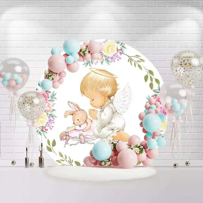Round baby shower backdrop with angel, bunny, and pink floral design