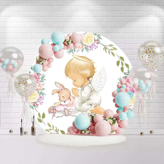 Round baby shower backdrop with angel, bunny, and pink floral design