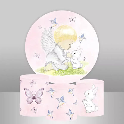 Angel-themed round backdrop with an angel baby and bunny, surrounded by butterflies and birds, along with three matching cylinder covers featuring butterflies, birds, and bunny designs.