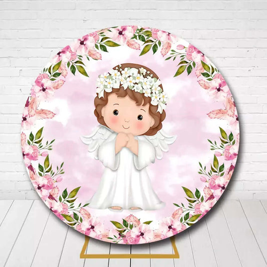 Round baptism backdrop with angel girl, white dress, and pink floral border