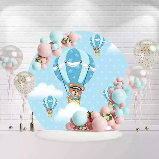 Playful baby bear in a colorful hot air balloon backdrop perfect for a baby shower or first birthday