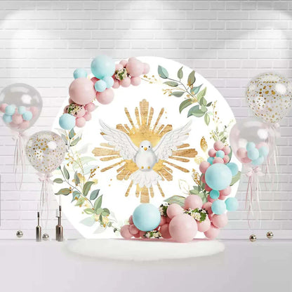 Round baptism backdrop with white dove, gold sunburst, and greenery leaves