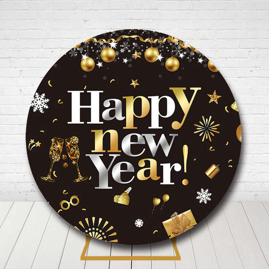 Round Happy New Year backdrop in black and gold with champagne glasses and decorations