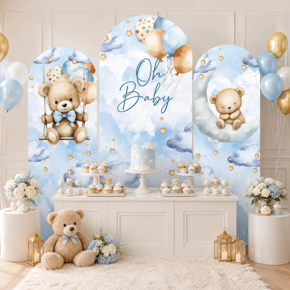 Blue teddy bear Oh Baby party set with three arch backdrop covers featuring watercolor clouds, stars, balloons, a teddy bear on a swing and a sleeping bear on the moon.
