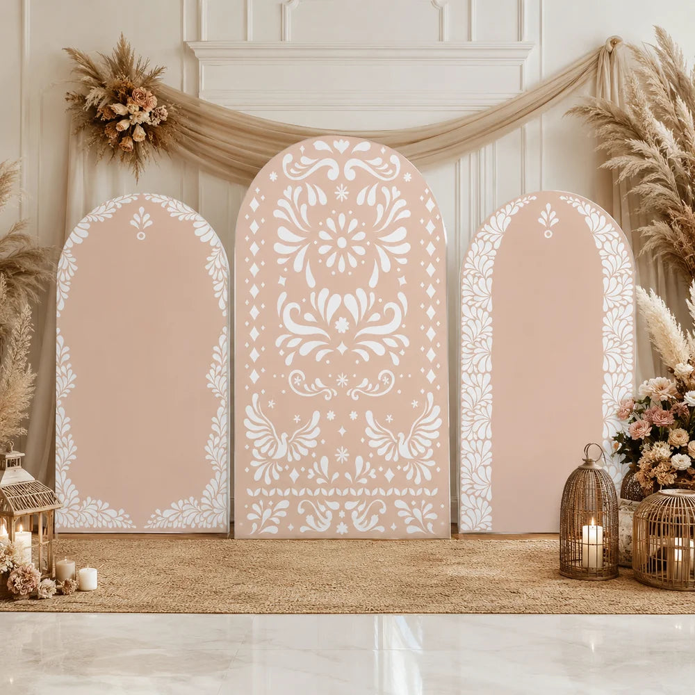 Blush boho party set with three arch backdrop covers featuring soft peach backgrounds, elegant white floral borders and an ornate folk-inspired botanical center design.
