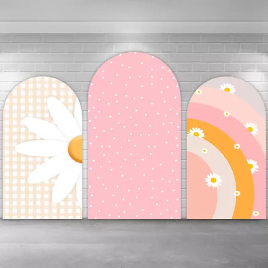 Pastel arch backdrop trio featuring a large daisy over gingham, a soft pink dotted middle panel, and a warm-toned rainbow with floral accents—perfect for spring, baby showers, or girly birthdays.