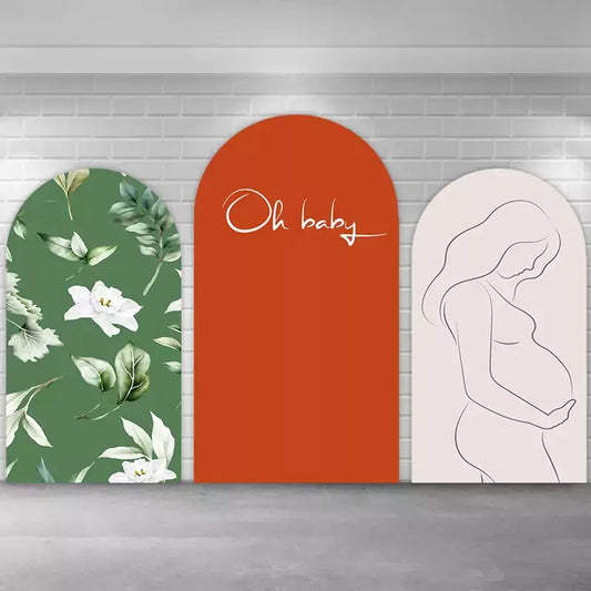 Elegant boho maternity backdrop trio with watercolor white florals on green, a simple terracotta arch with script text, and a modern pregnancy silhouette—ideal for baby showers or maternity photos.