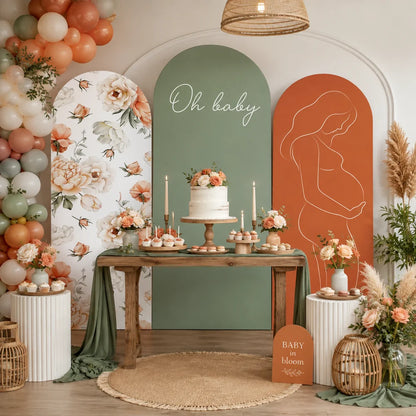 Boho baby shower set with three arch backdrop covers featuring peach and cream floral artwork, sage green Oh Baby lettering and a terracotta maternity silhouette.