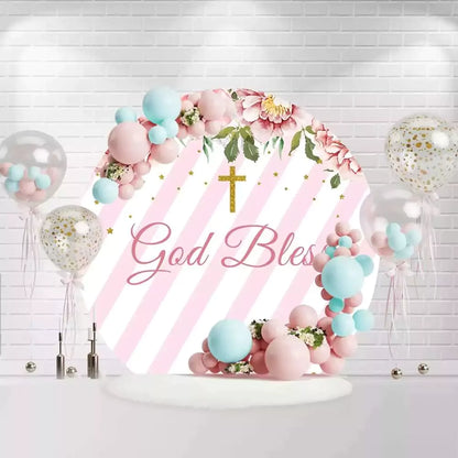 Round God Bless backdrop with pink stripes, flowers, and golden cross for baptism or christening