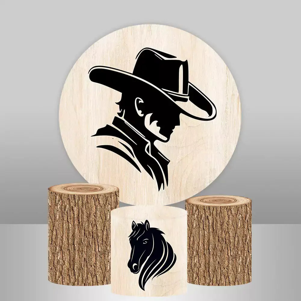 Round backdrop featuring a cowboy silhouette with three matching cylinder covers displaying a horse head design and wood log textures.