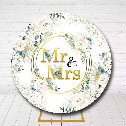 White and green floral Mr and Mrs backdrop with golden circle design