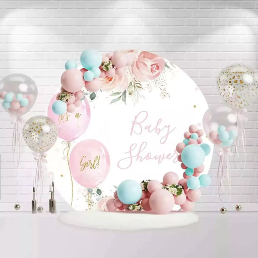 Elegant floral backdrop for baby shower with pink 'It's a Girl' balloons and soft pastel colors