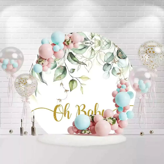 Round Oh Baby backdrop with greenery leaves and gold lettering for baby shower decoration
