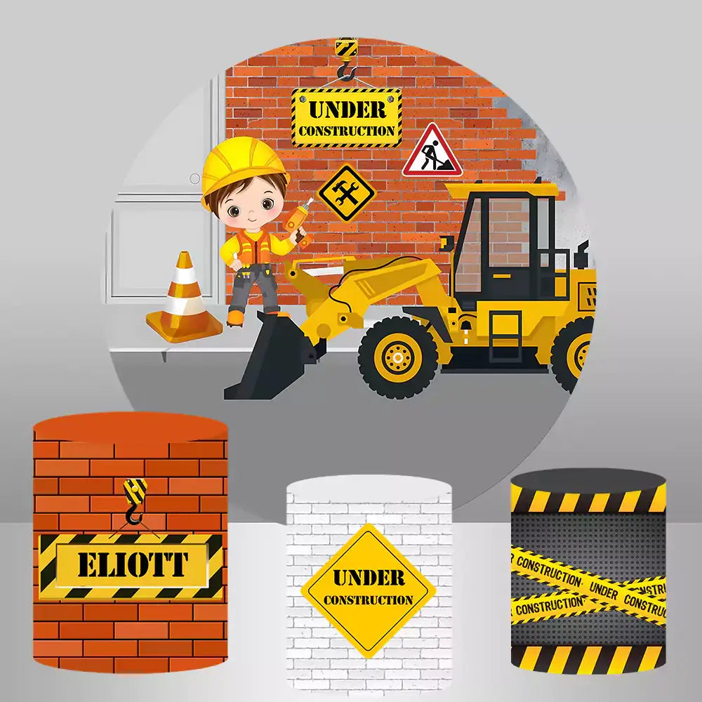 Construction-themed round backdrop with a child construction worker, digger, and "Under Construction" signs, along with three cylinder covers featuring brick wall, caution tape, and construction sign designs.