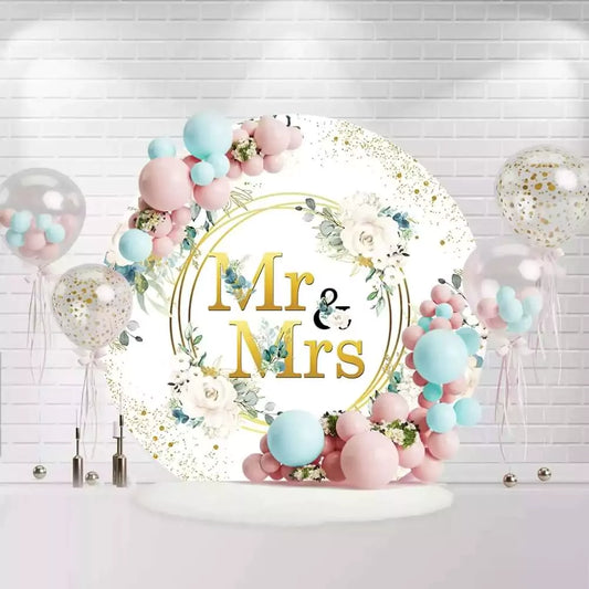 Elegant Mr & Mrs wedding backdrop with gold lettering and floral border