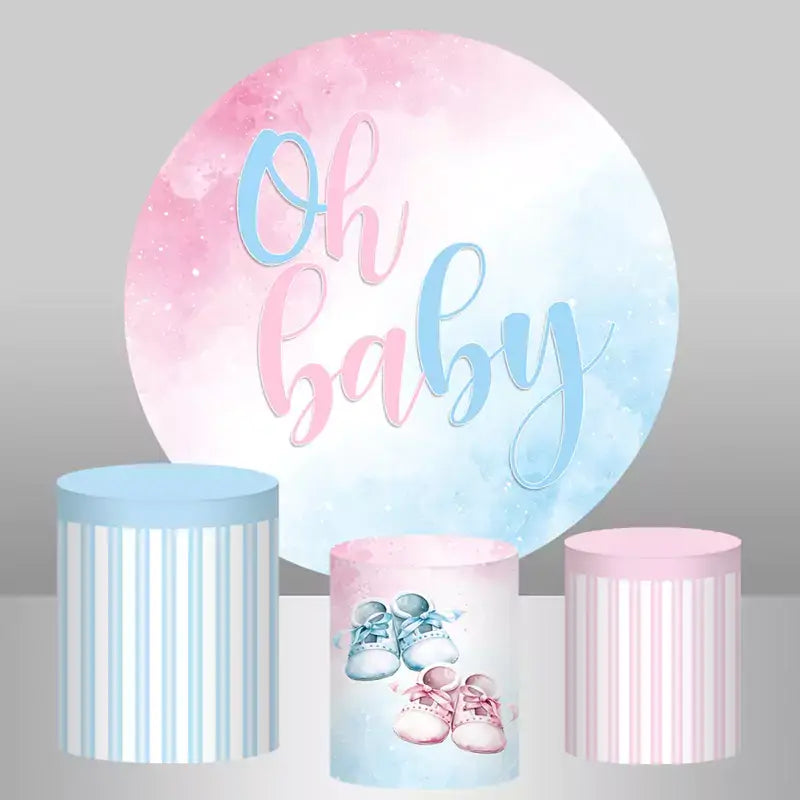 Pastel pink and blue Oh Baby round backdrop with three matching cylinder covers for baby shower
