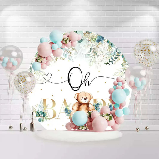 Round baby shower backdrop with teddy bear, greenery, and gold Oh Baby text