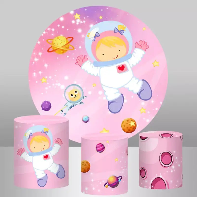 Pink round backdrop with girl astronaut and planets plus three matching space themed cylinder covers