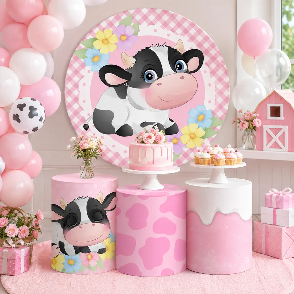 Pink cow birthday party set with one round backdrop and three matching cylinder covers featuring a cute black and white cow, floral accents and pink cow print designs.