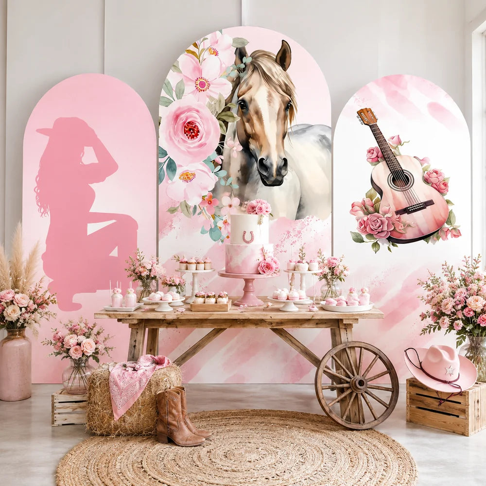 Pink cowgirl party set with three arch backdrop covers featuring a cowgirl silhouette, watercolor horse with pink flowers, and a floral pink guitar design.