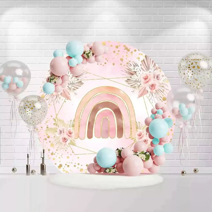 Pink and gold rainbow backdrop for a birthday party, featuring boho floral design and soft pink tones