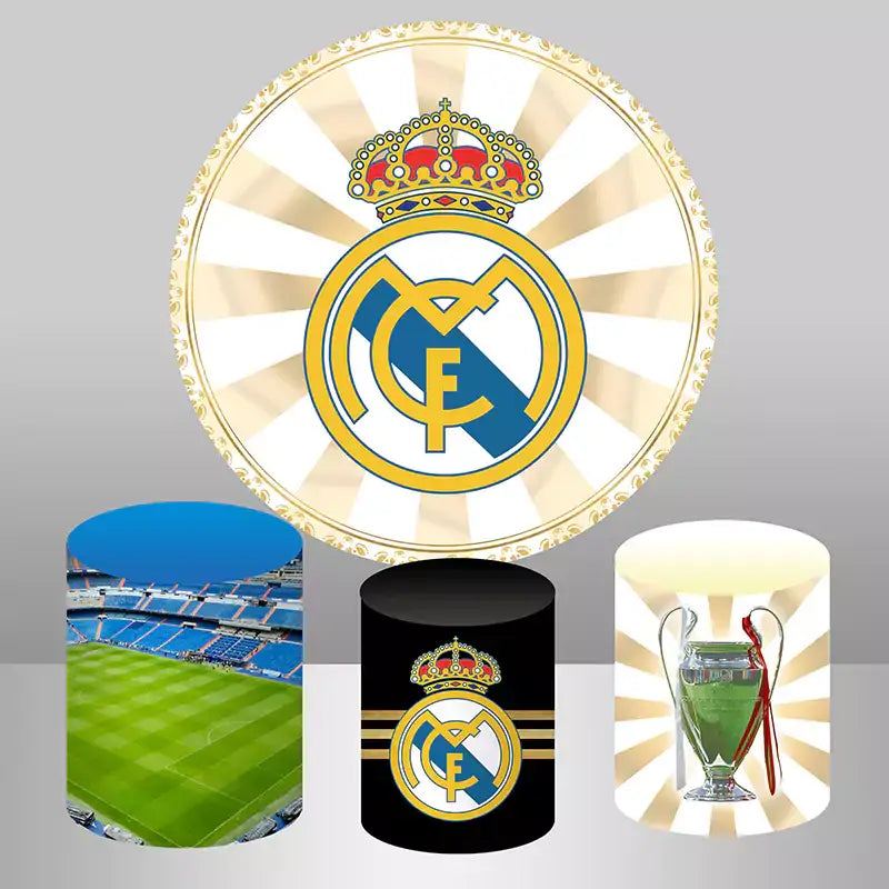 A Real Madrid-themed party decor set featuring a round backdrop with the club’s crest and three matching cylinder covers with a football stadium, the club logo, and a championship trophy.