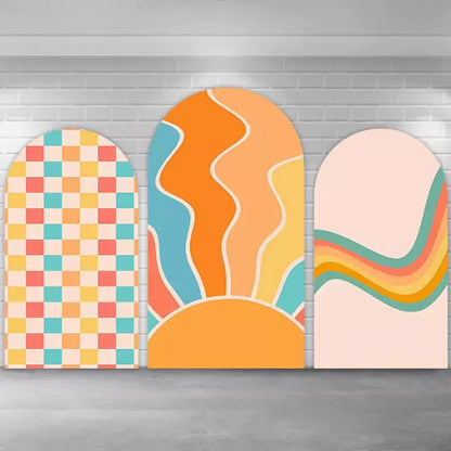Vintage-inspired arch backdrop trio with a central rising sun in warm orange tones, complemented by a pastel checkerboard pattern and a wavy rainbow stripe panel—ideal for retro birthdays or modern boho events.