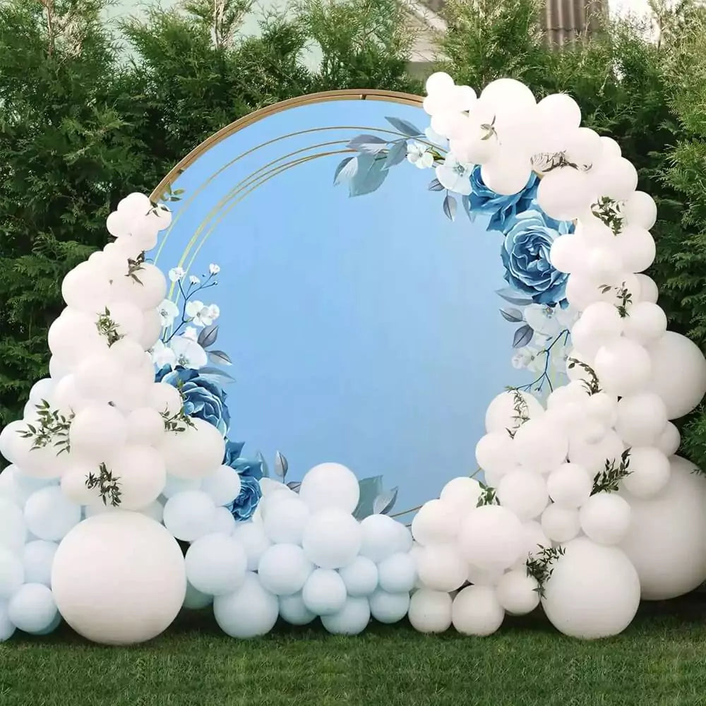 Blue floral wedding backdrop with roses, white flowers, and gold accents