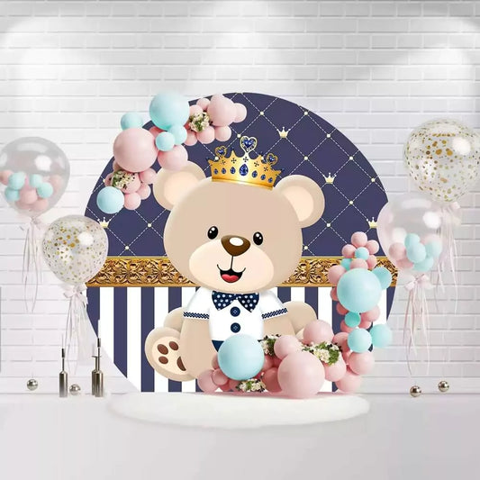 Royal teddy bear wearing a crown for baby boy’s birthday party backdrop