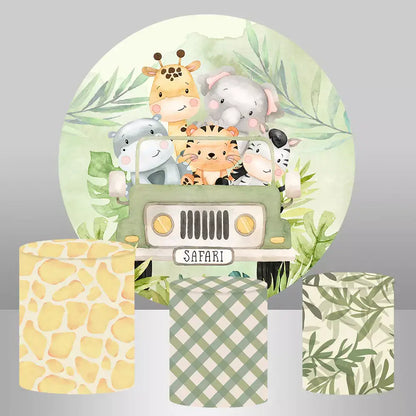 Round backdrop with cute safari animals in a jeep surrounded by greenery and 3 matching cylinder covers