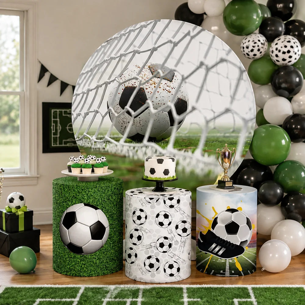 Soccer party set with one round goal net backdrop and three matching cylinder covers featuring soccer balls, green field and cleat designs.