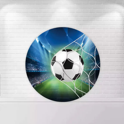 Round backdrop featuring a soccer ball hitting the net in a stadium